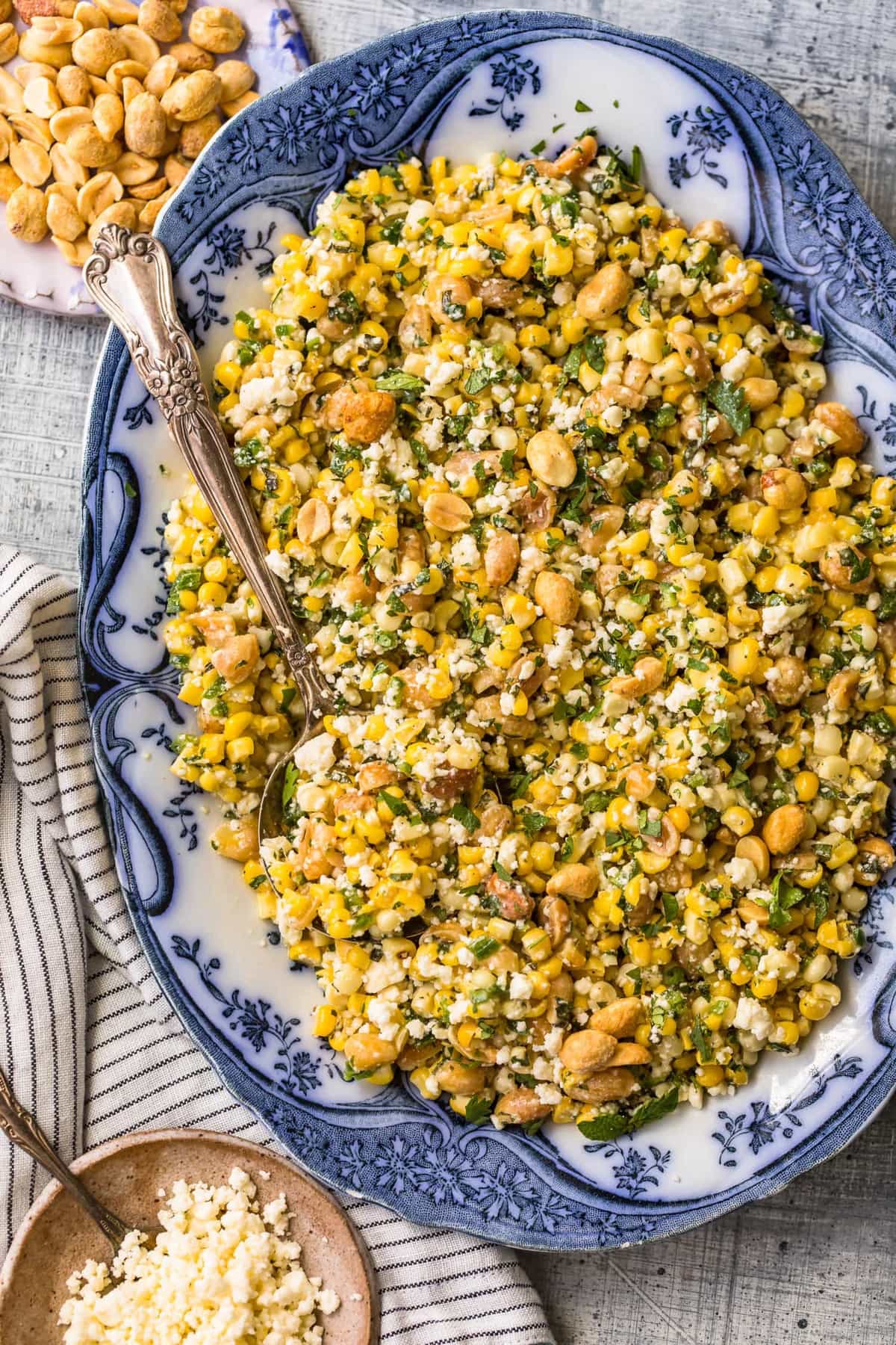 Yellow salad on a blue and white plate