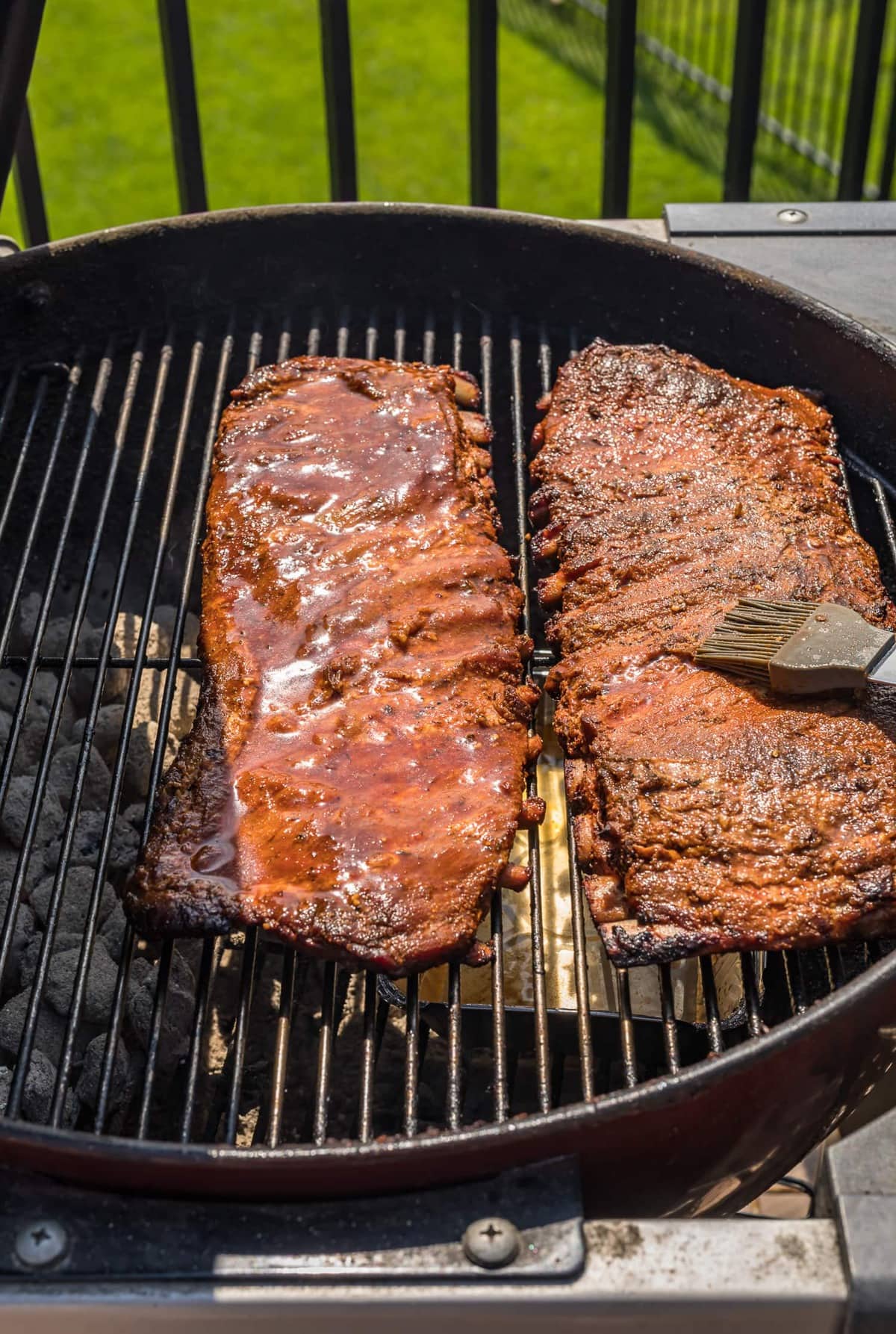 St.Louis Grilled Ribs being brushed with marinade