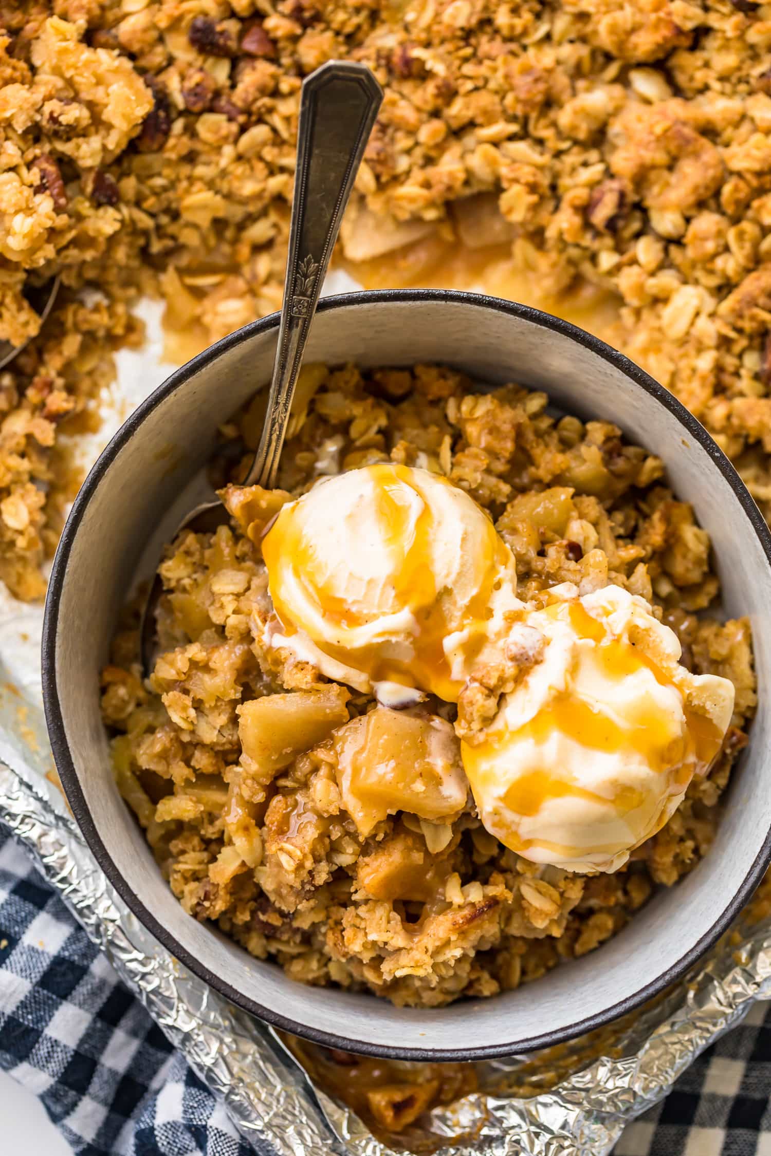 Top shot of apple crisp in a white bowl