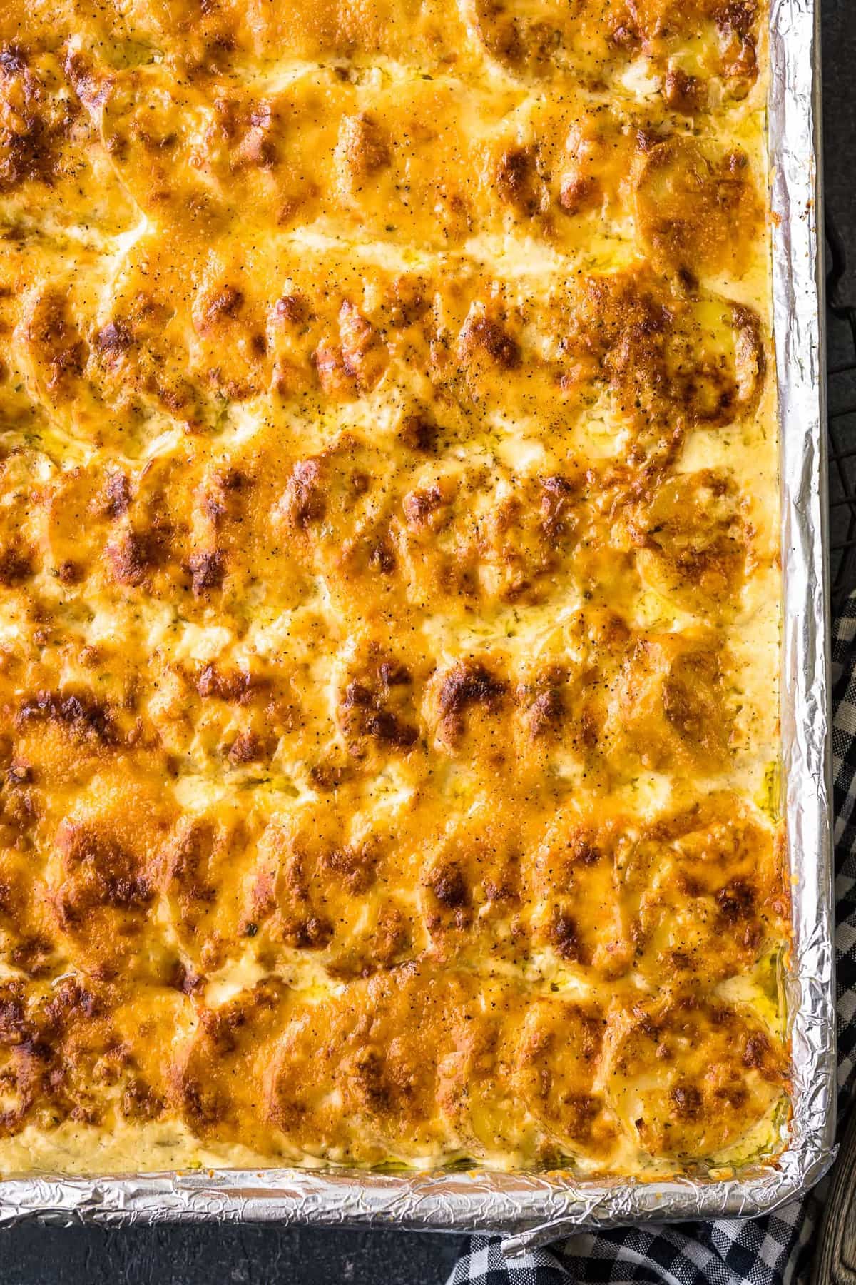 scalloped potatoes baked in a sheet pan