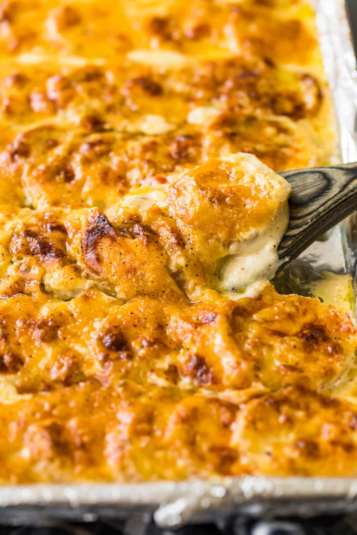 Creamy side dish lifted out of the sheet pan