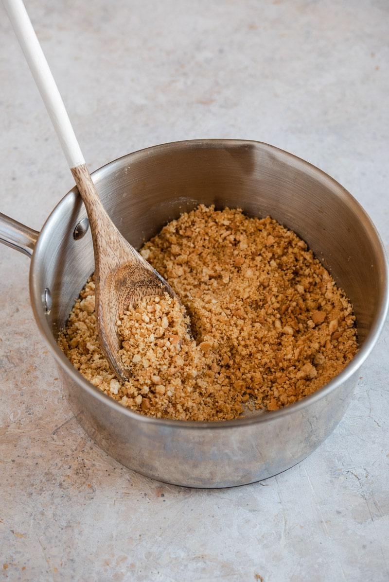 crust ingredients in pan with spoon