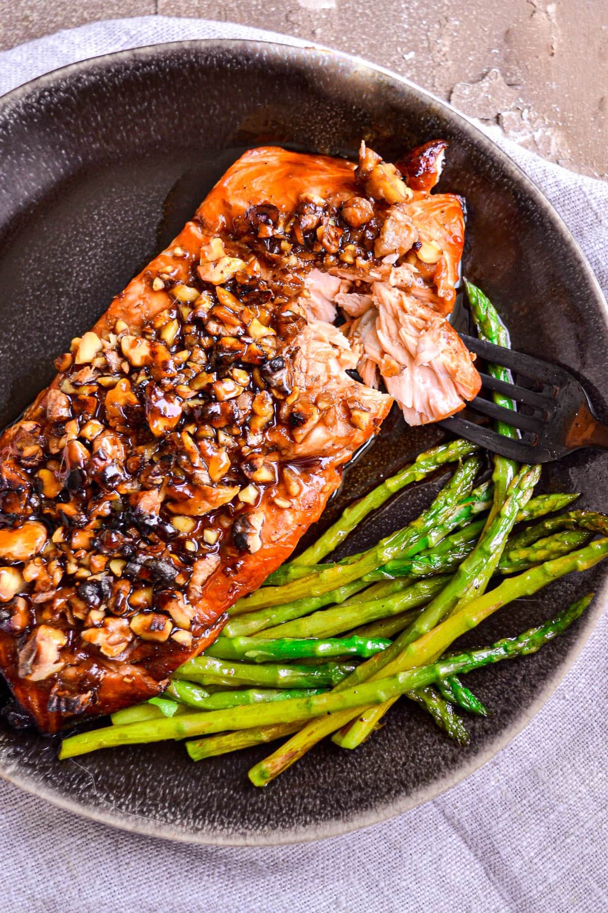 fork full of bourbon glazed salmon