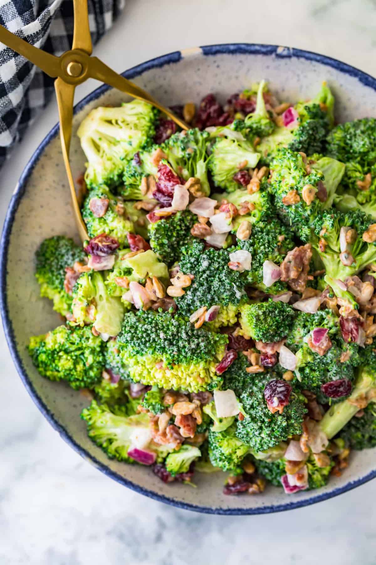 Broccoli salad in a large serving bowl