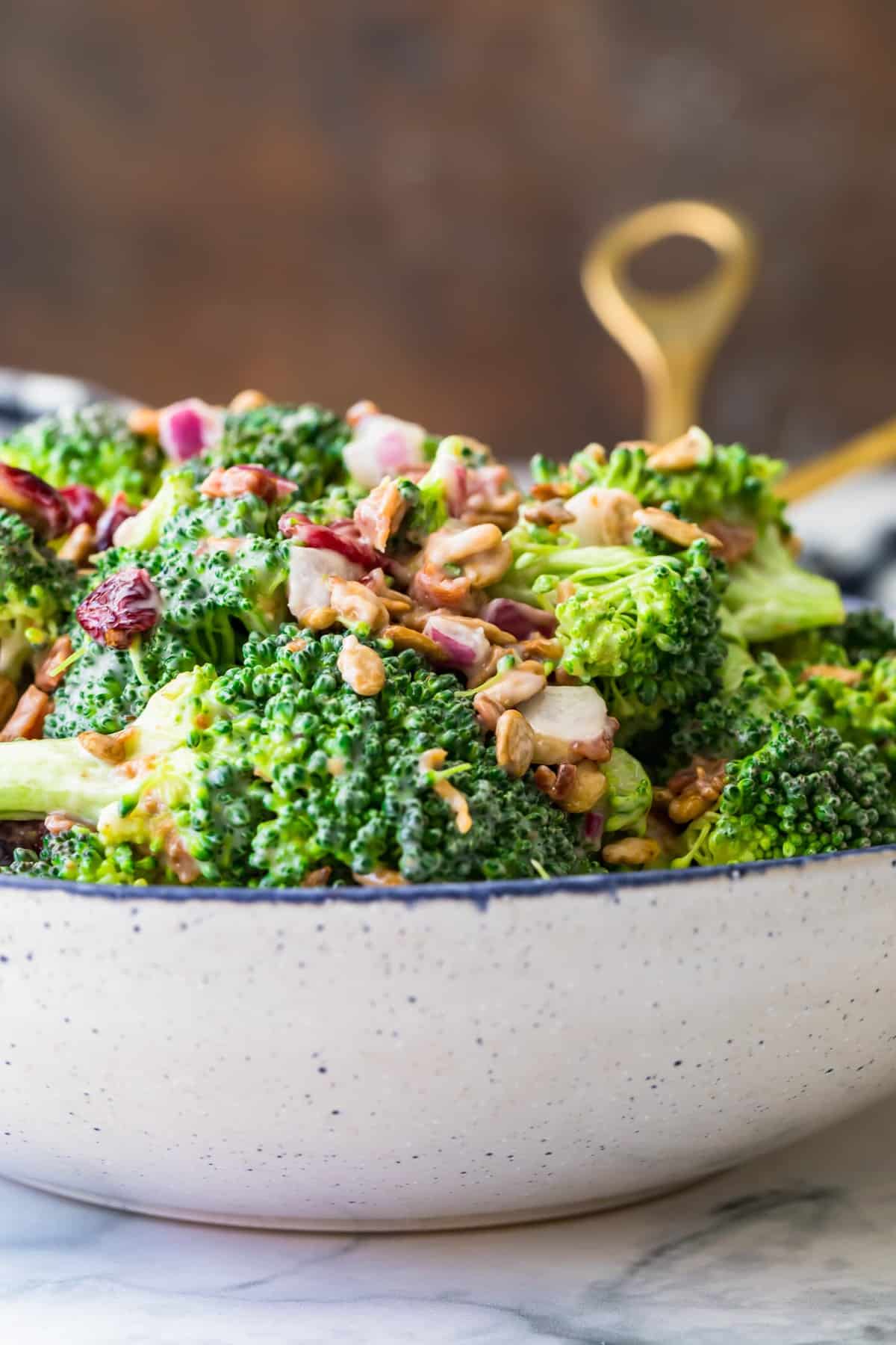 Broccoli salad ready to serve in a large bowl