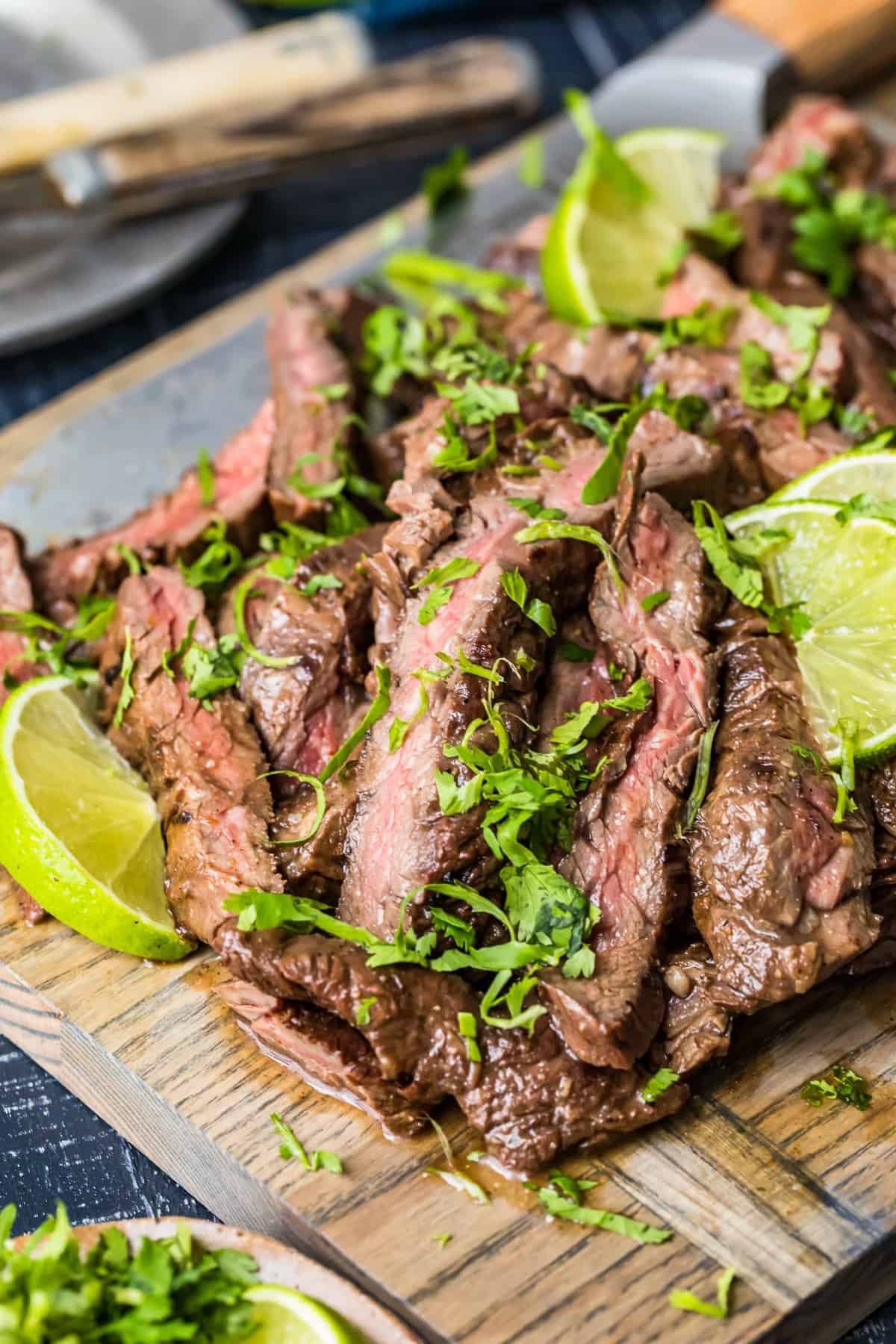 Sliced beef sprinkled with fresh herbs