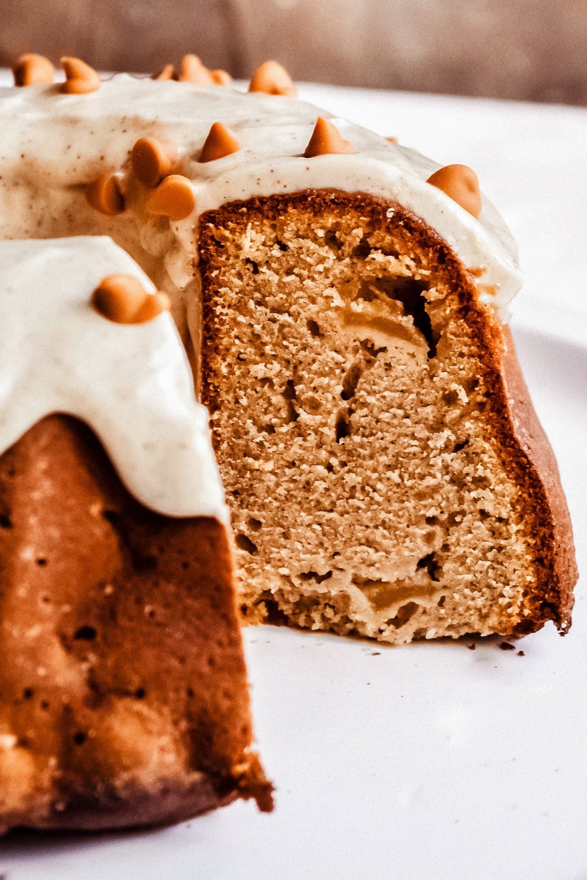 Chunky Apple Bundt Cake with a slice cut out.