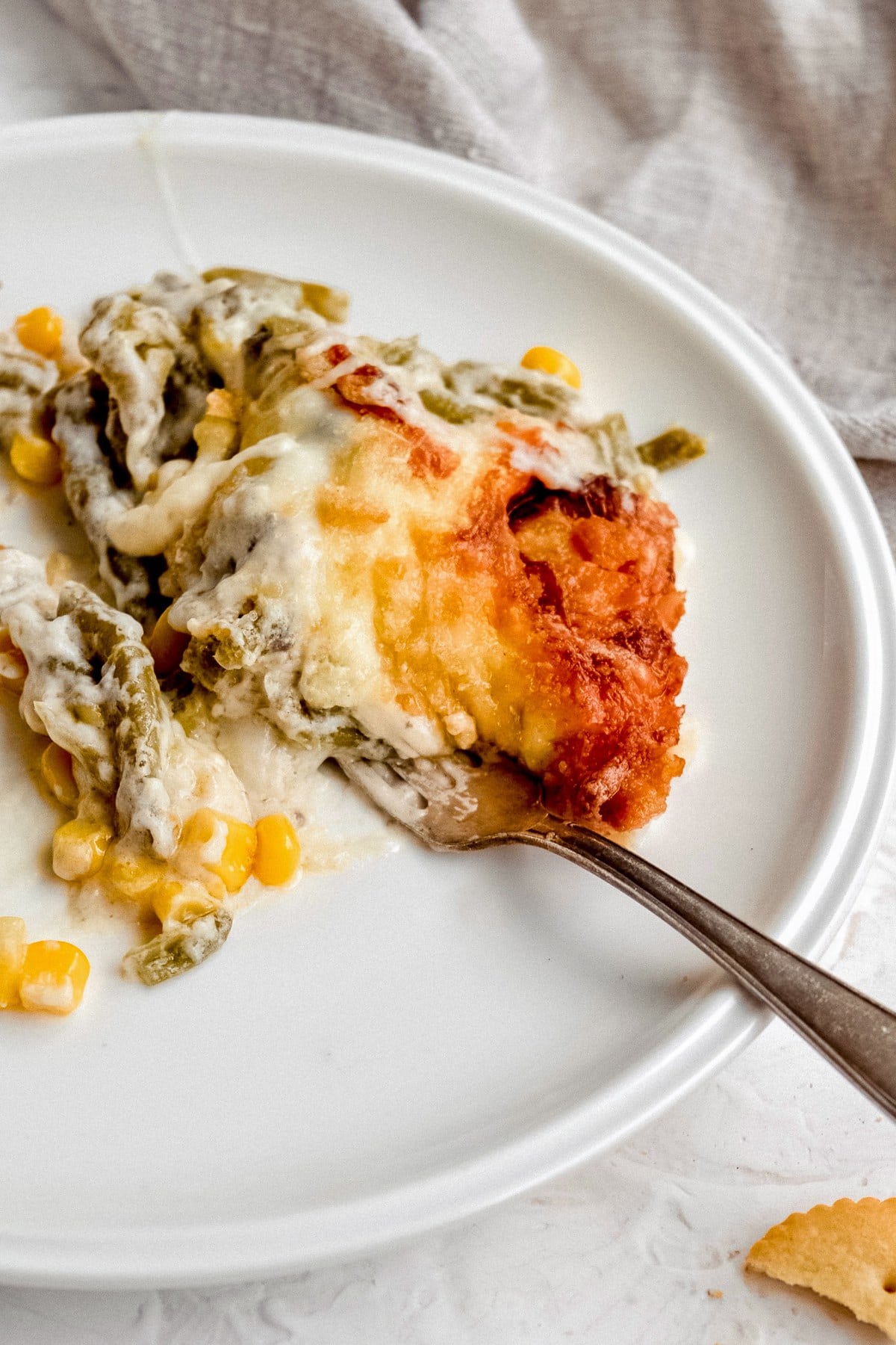 Green Bean and Corn Casserole with Cheese on a plate