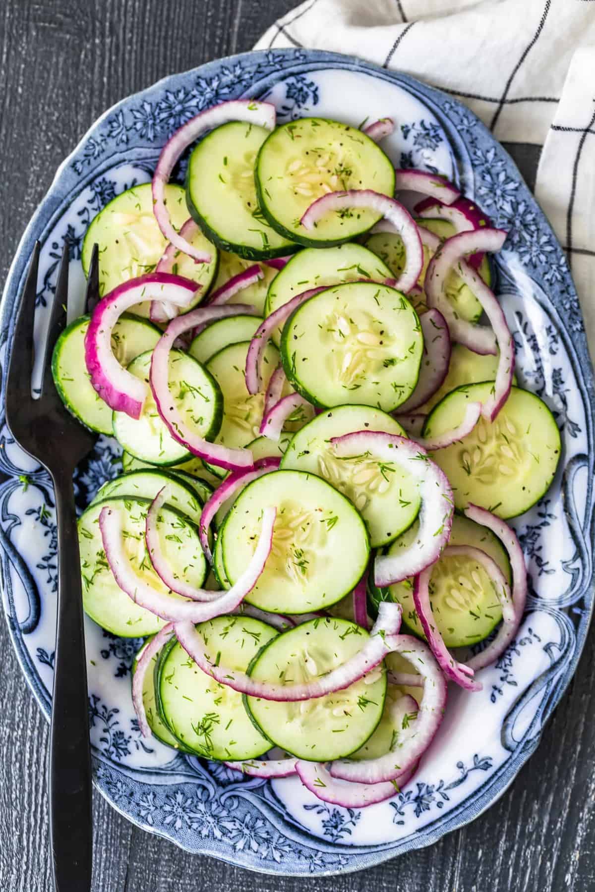 Cucumber and onion salad topped with fresh dill