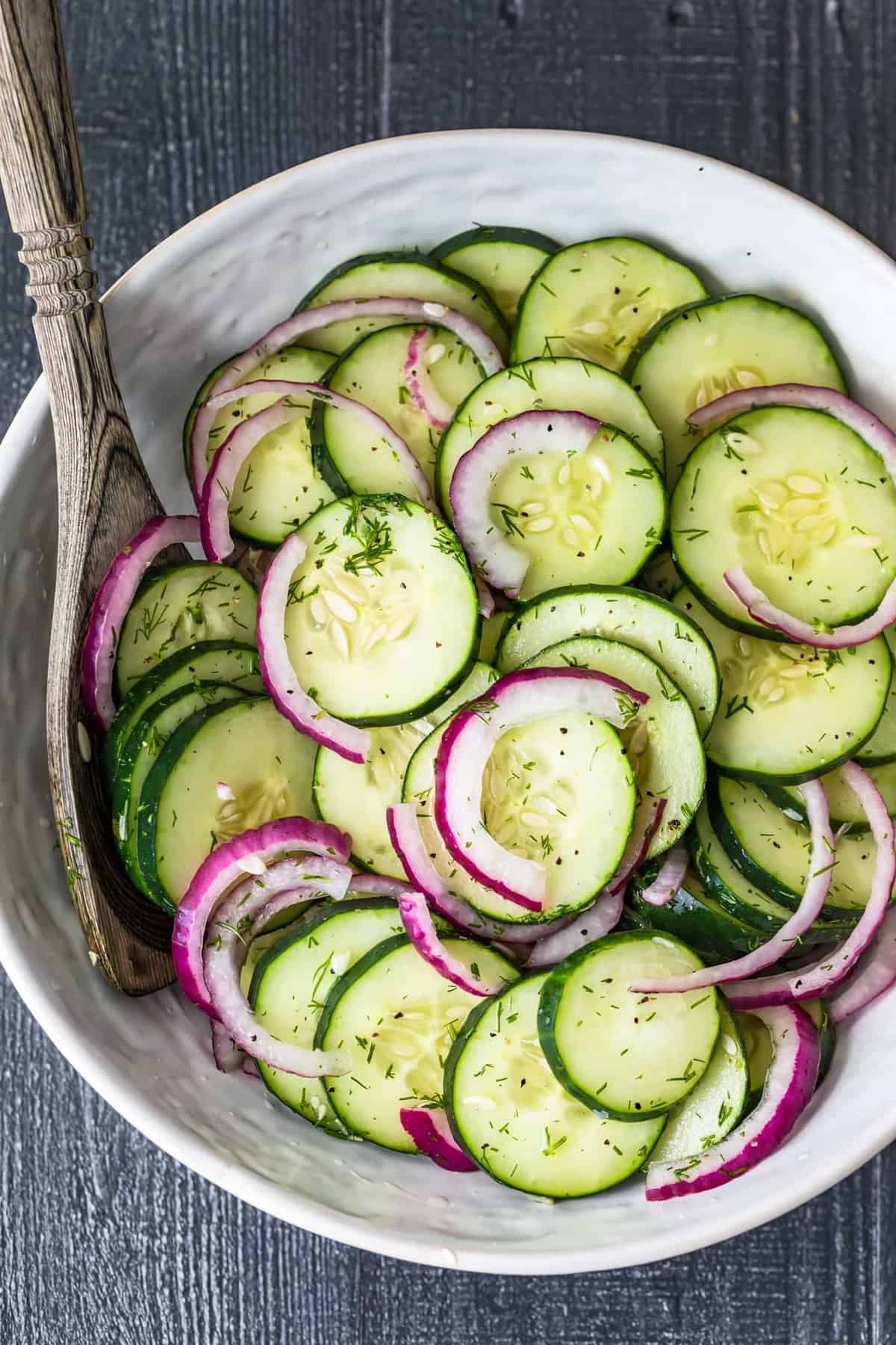 Easy cucumber salad in a white serving bowl