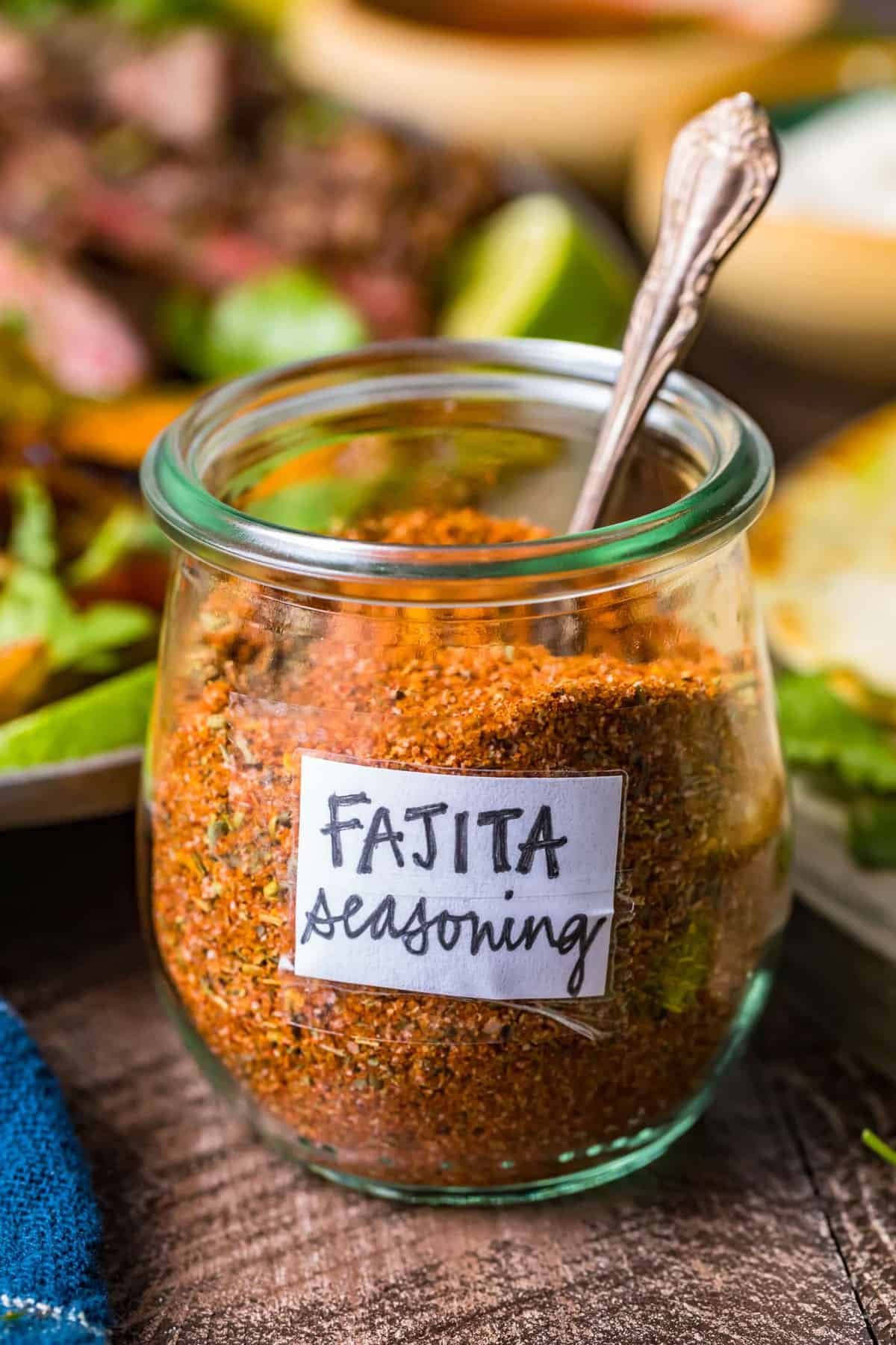 Close up of homemade fajita seasoning in a glass jar