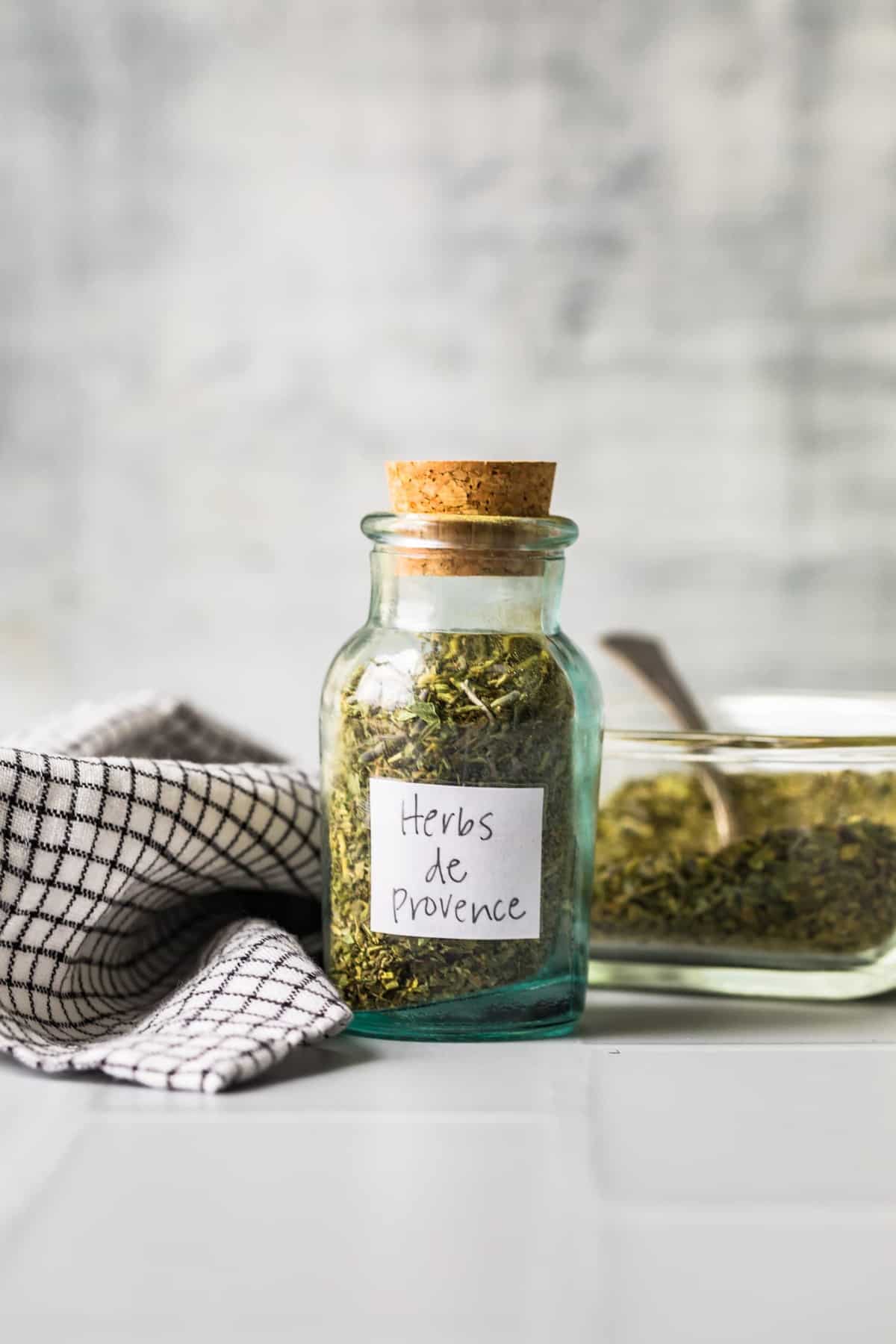 A jar of Herbs de Provence with a label