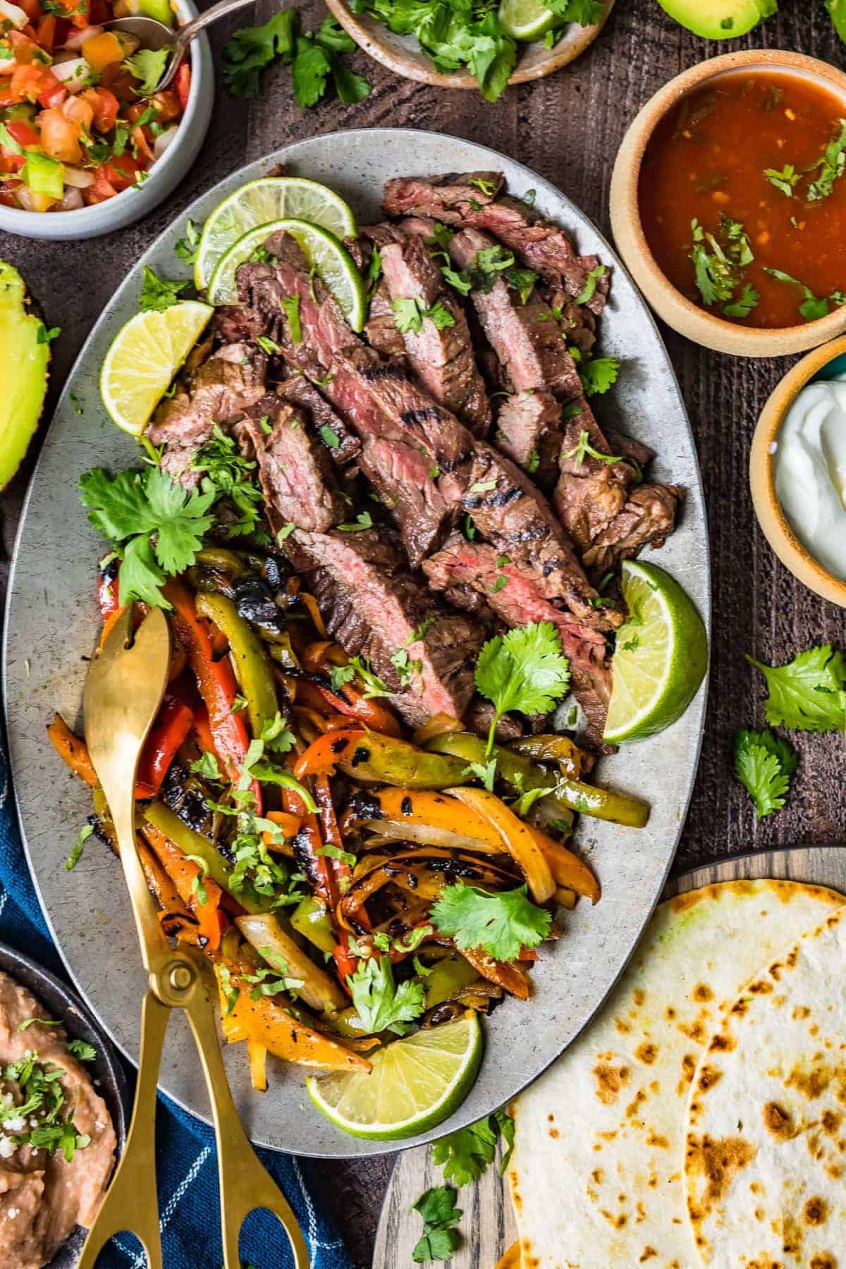 Top down shot of the steak fajitas on a serving plate