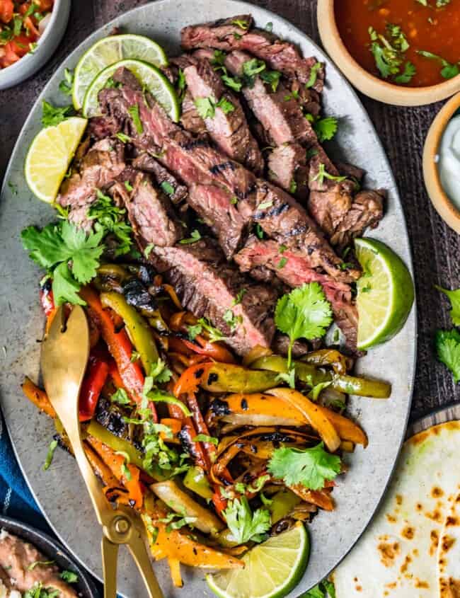 sliced steak and vegetables on a plate