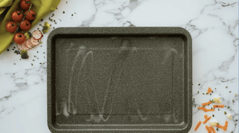 a baking sheet sprayed with nonstick spray.