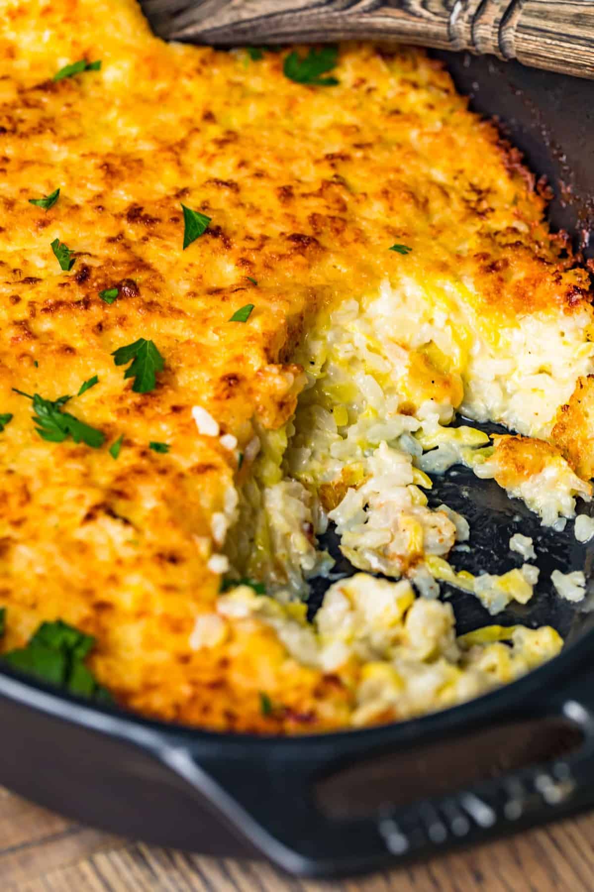 A cheesy baked side dish with rice