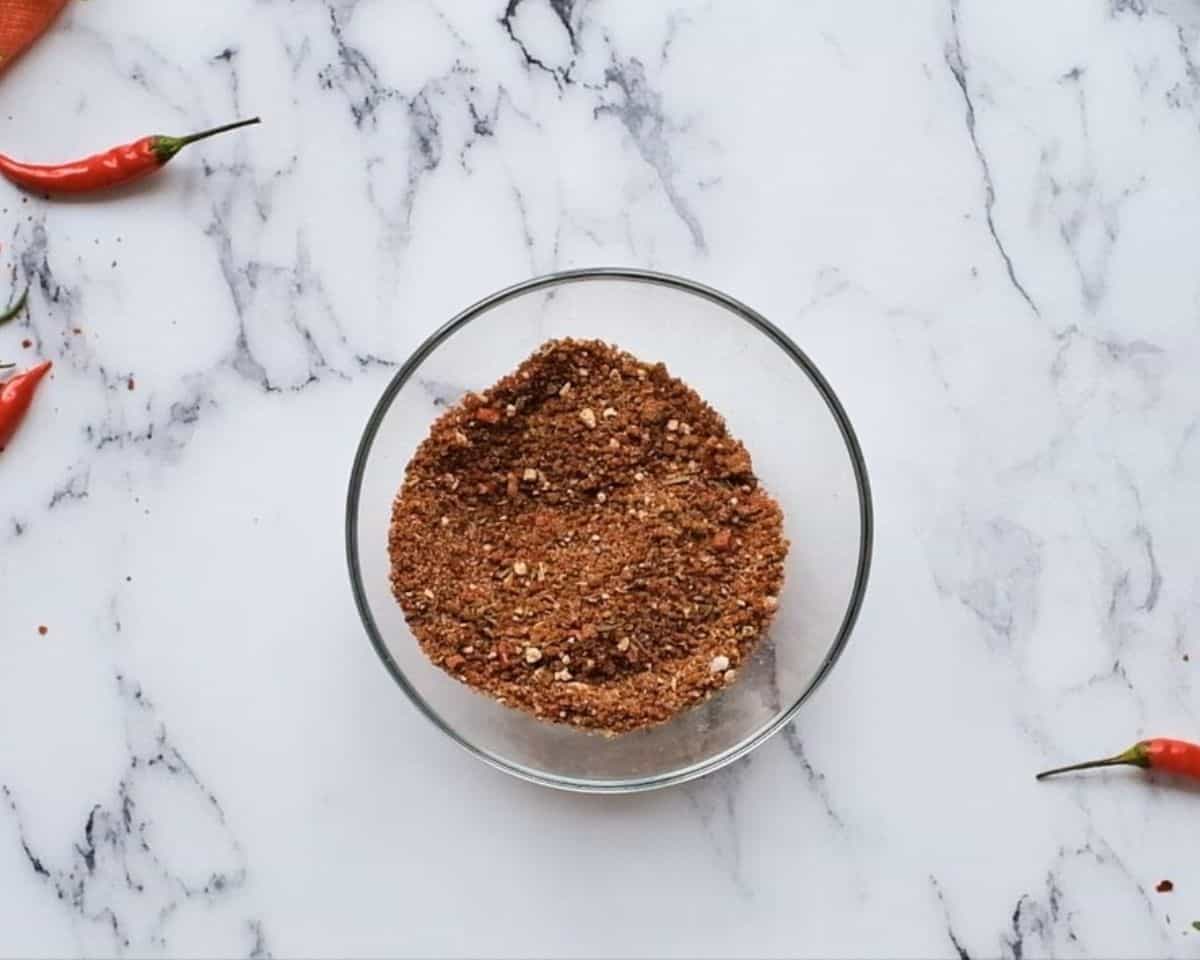 Spices combined to make fajita seasoning.