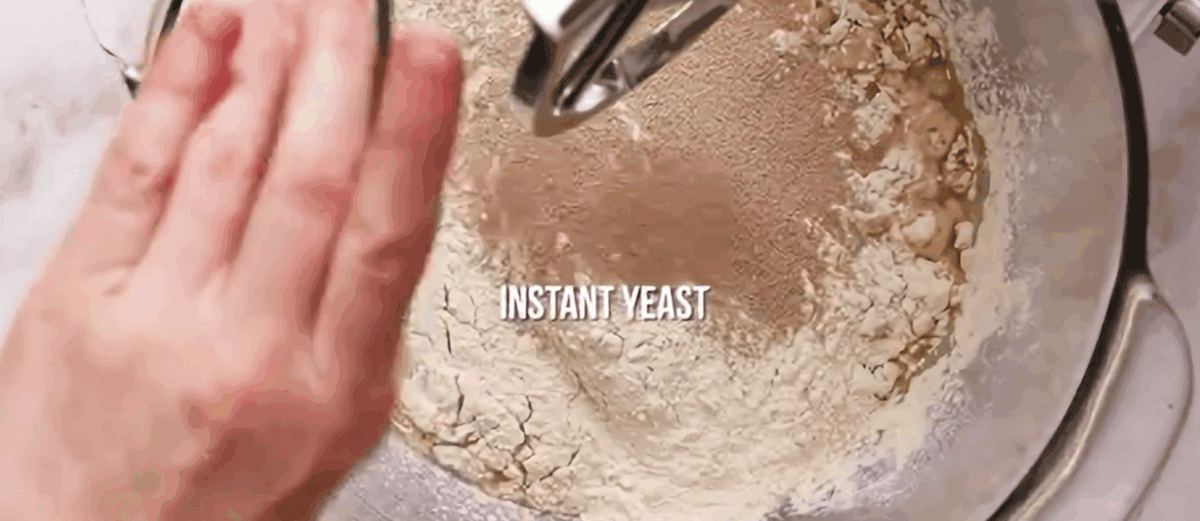 Combining the focaccia ingredients in a mixer. 