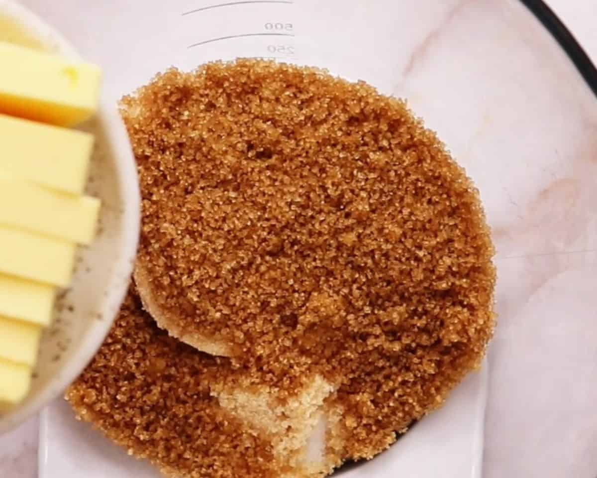 Combining the sugars with butter.