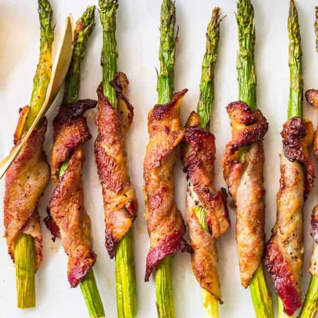 bacon wrapped asparagus with dijon on platter
