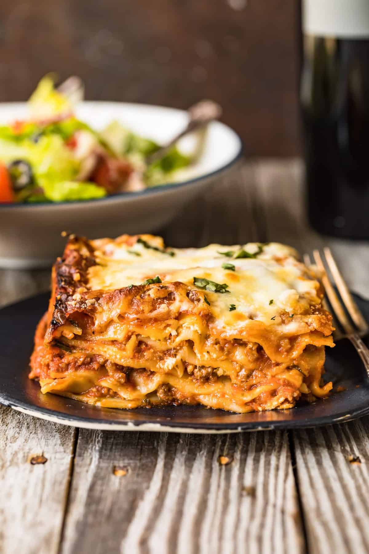 Lasagna served on a blue plate