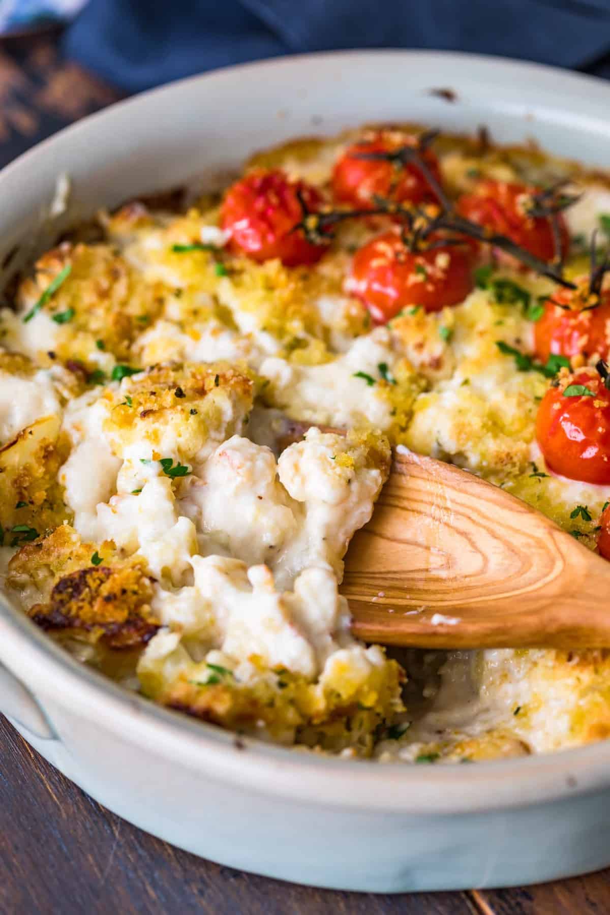 Serving the vegetable side dish with a wooden spoon