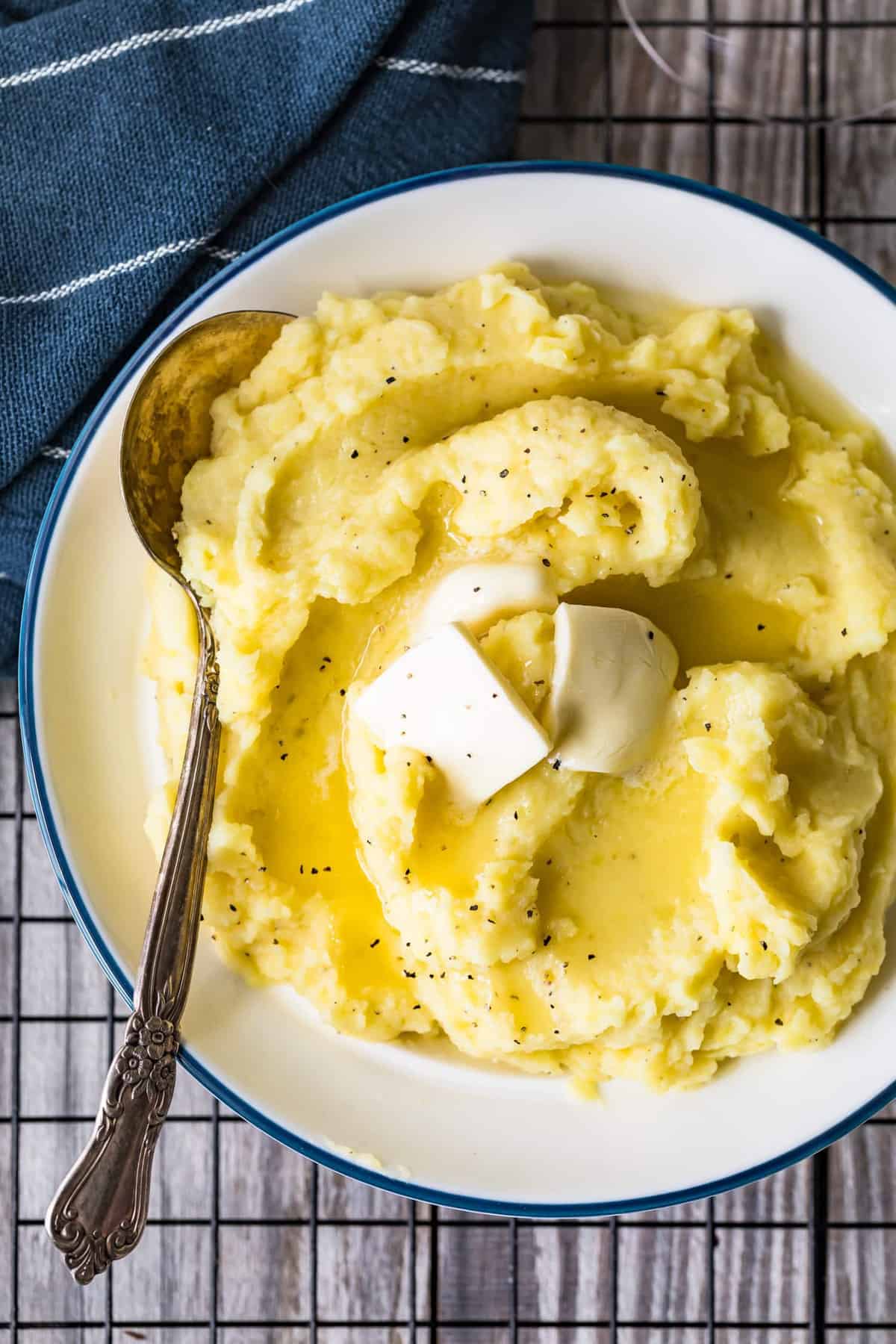 Mashed Potatoes in a bowl topped with butter