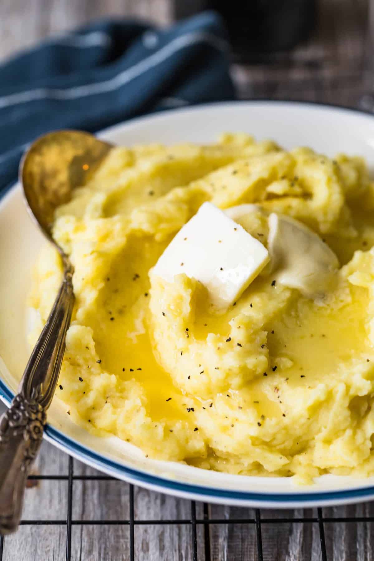 Mashed Potatoes in a bowl with a serving spoon