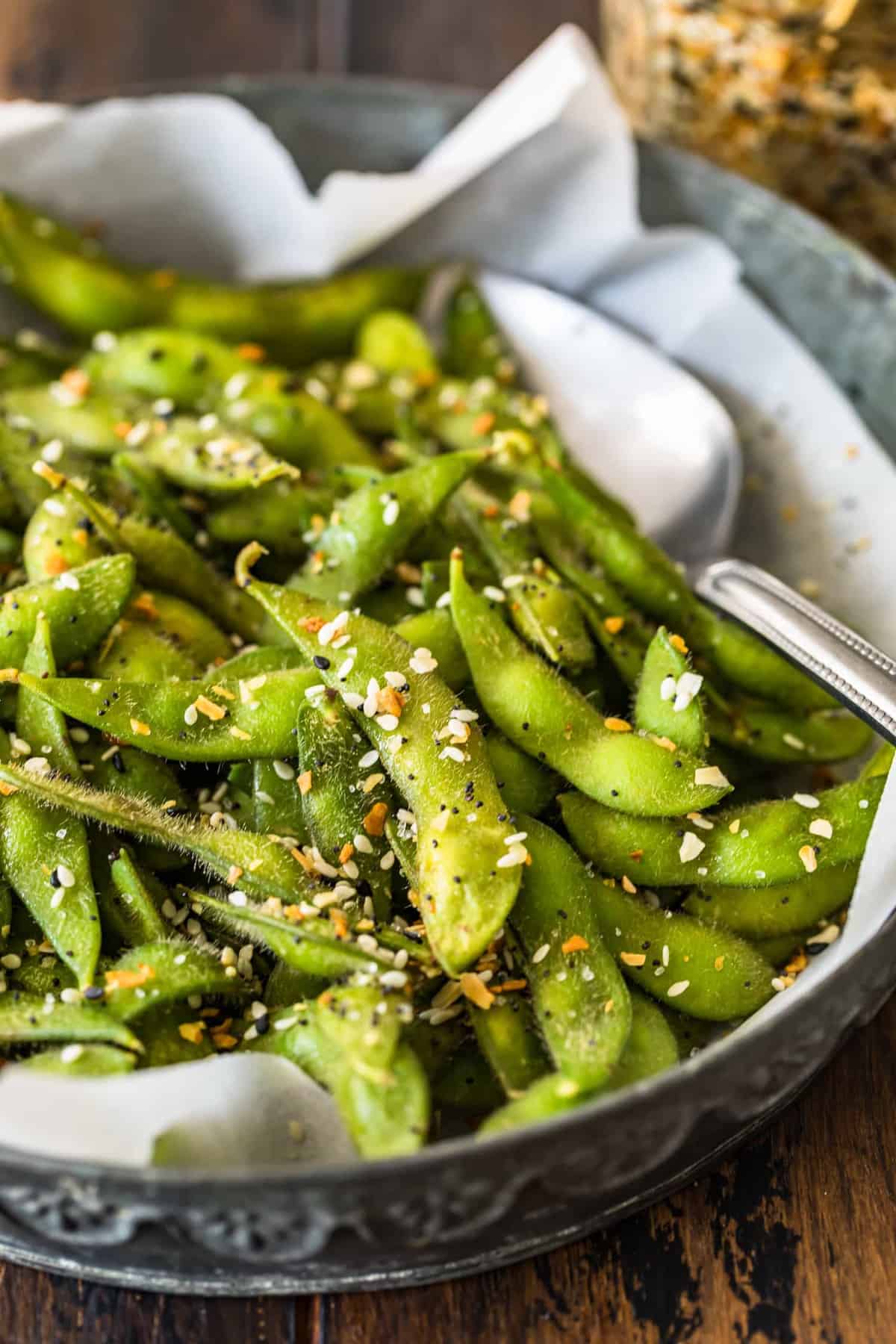 A close up view of edamame with spoon