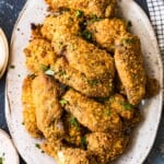garlic parmesan wings on a white plate
