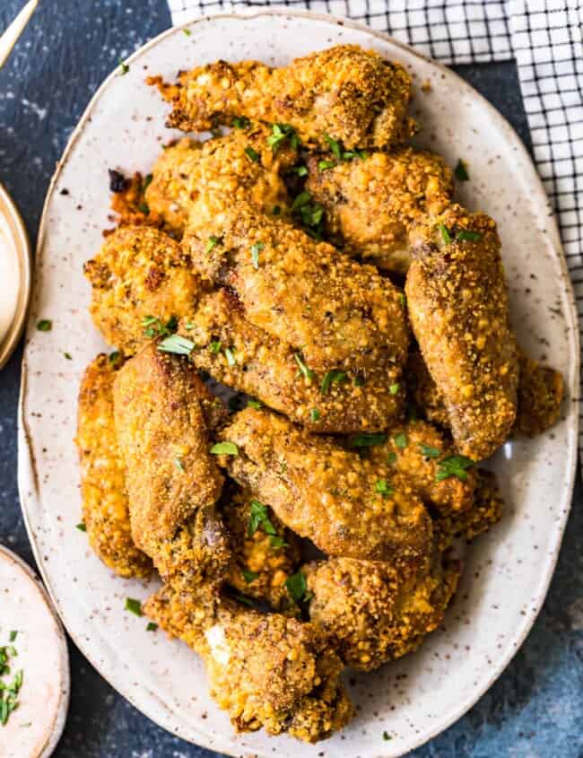 garlic parmesan wings on a white plate