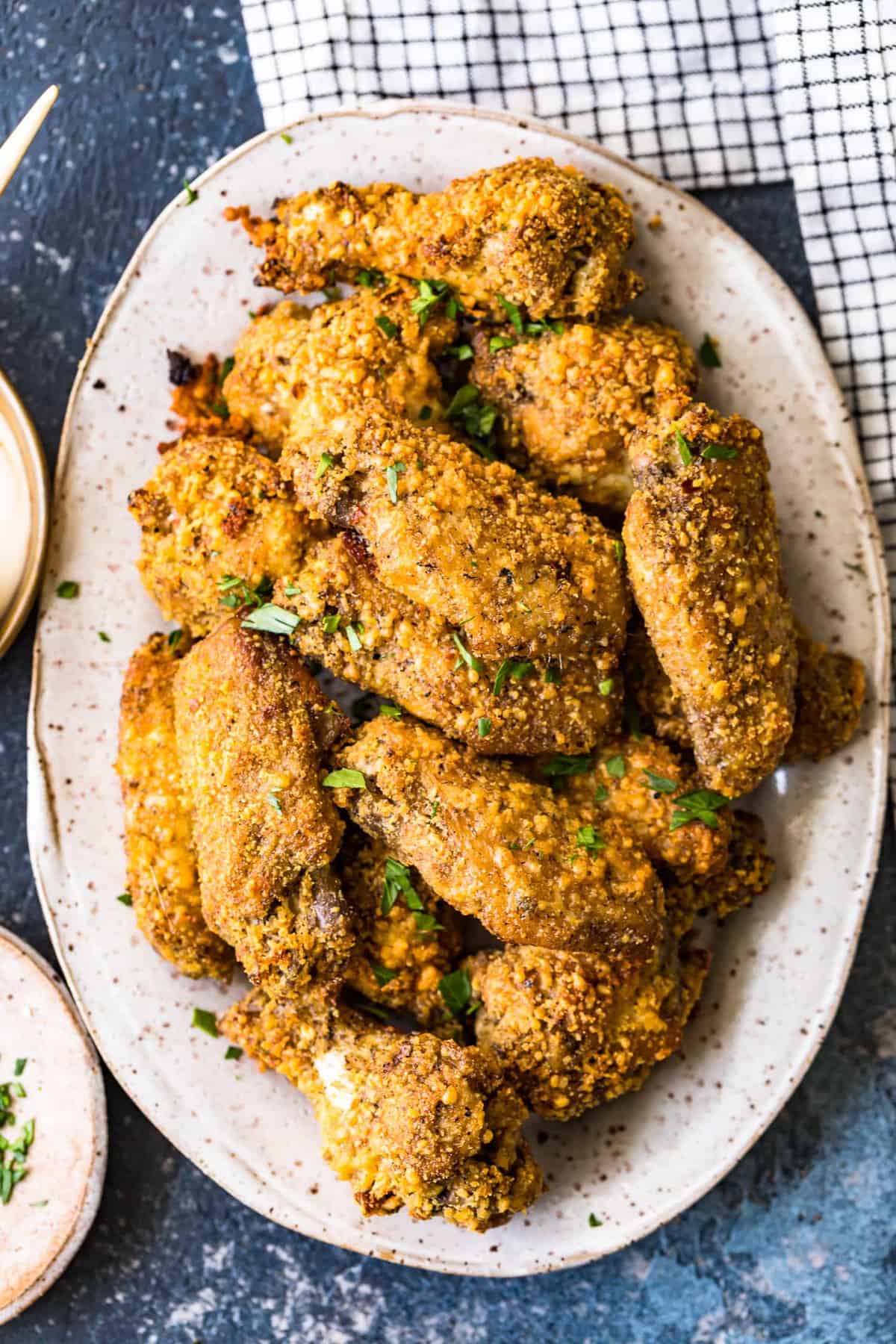 Garlic Parmesan Chicken Wings on a white serving plate