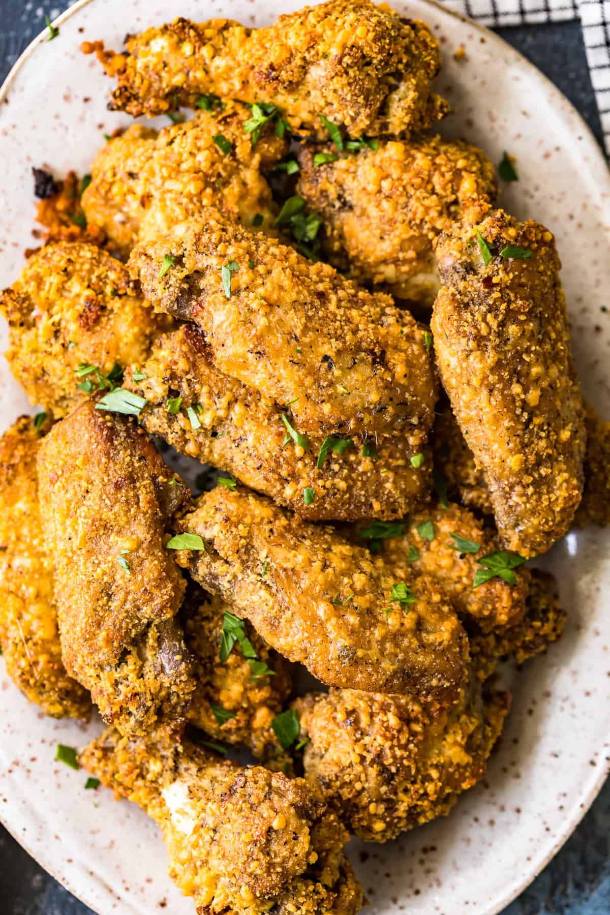 Top shot of baked wings on a serving plate