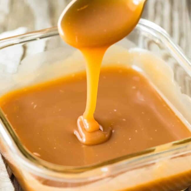 caramel falling from spoon into dish