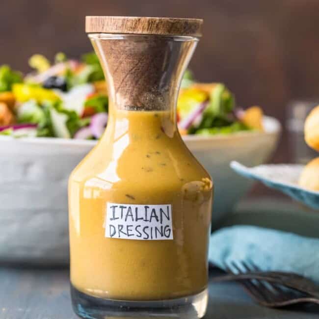 a bottle of italian dressing on a table