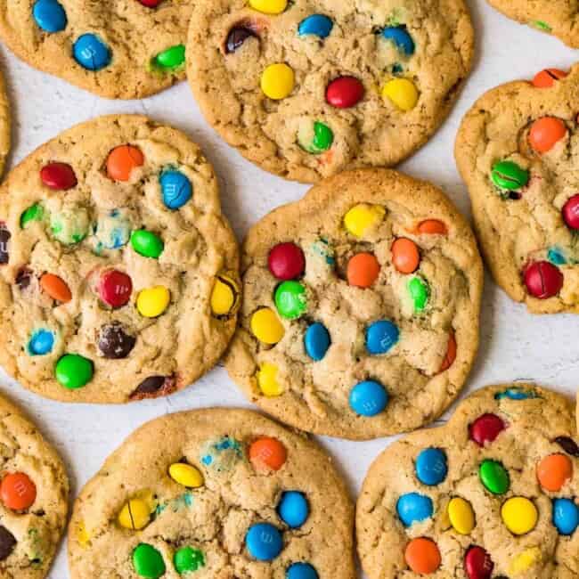 Colorful M&M cookies on a white surface, known for being the best.