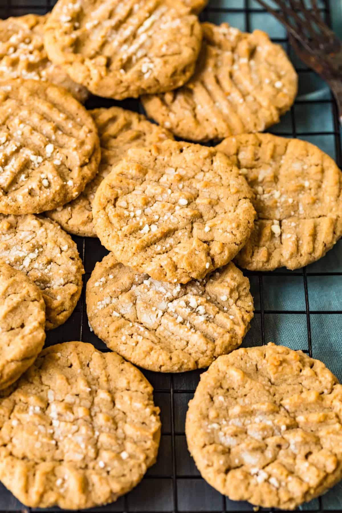 Peanut butter cookies piled on top of each other