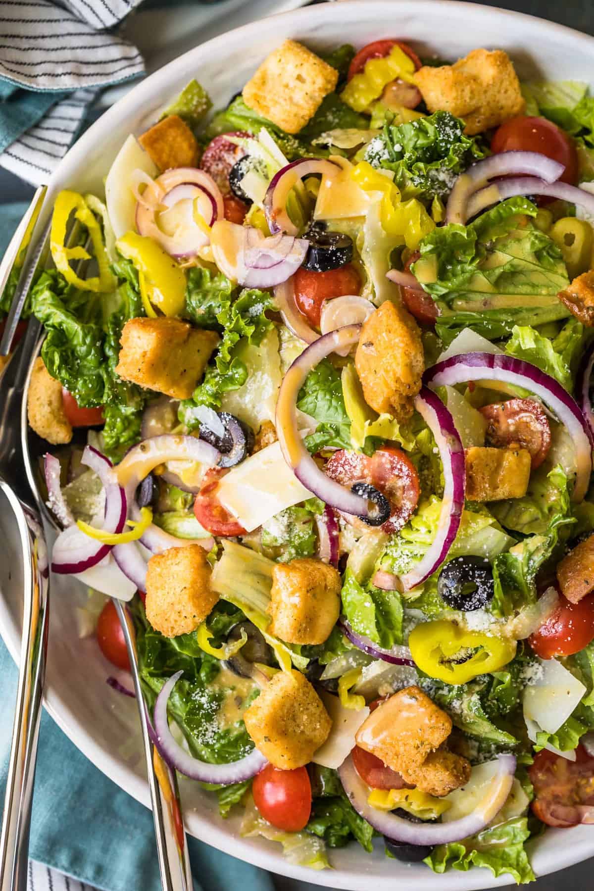 olive garden salad served in a large white bowl