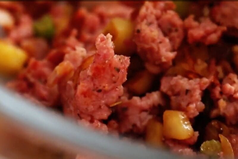 mix sausage/bacon with vegetables mix in glass bowl.