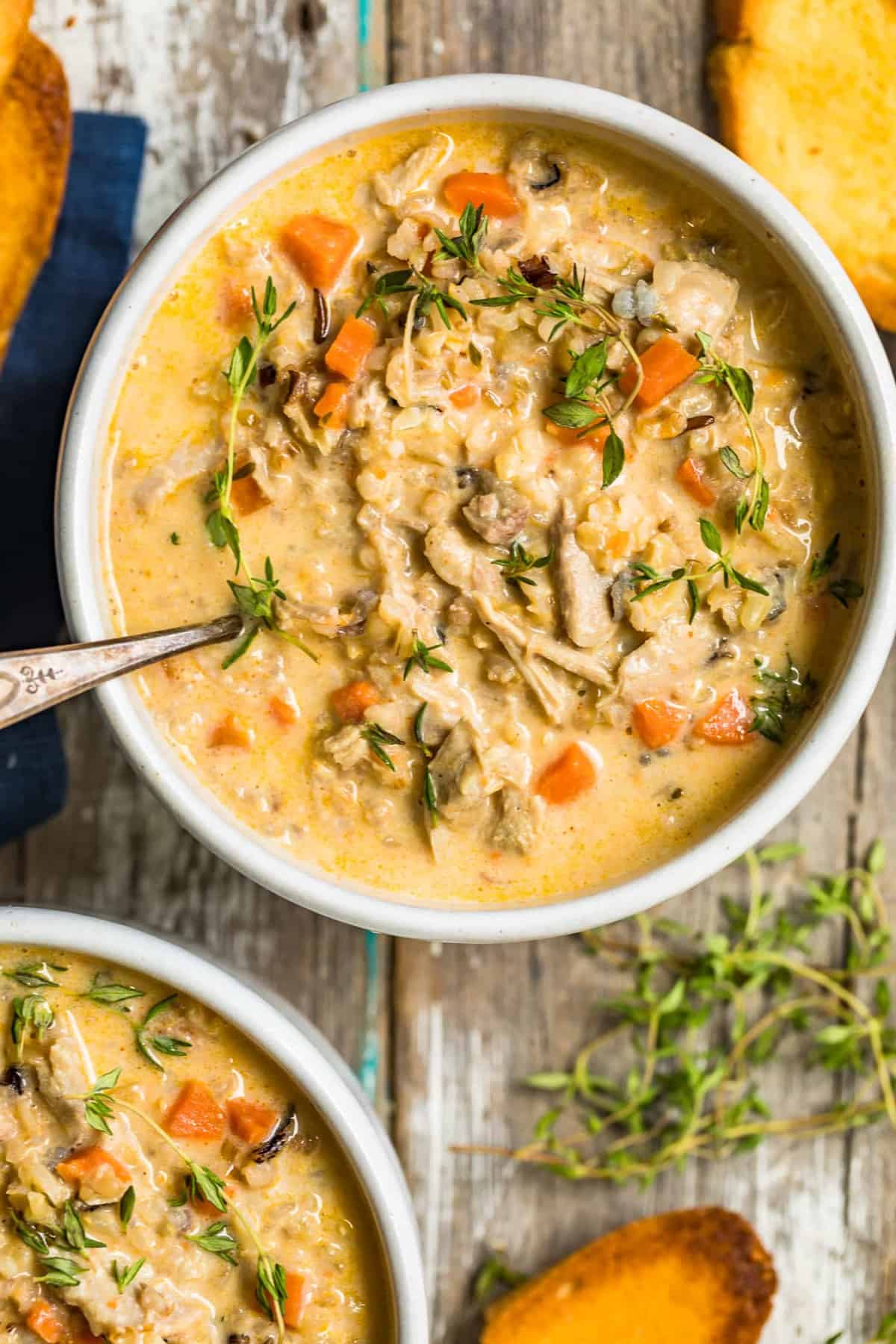 Soup topped with fresh herbs