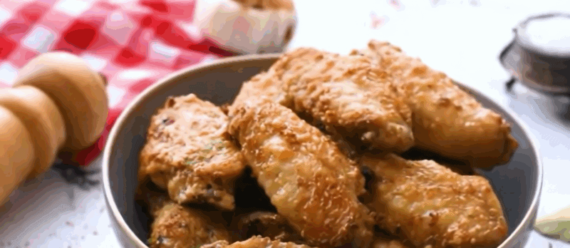 Garlic Parmesan chicken wings in a bowl.