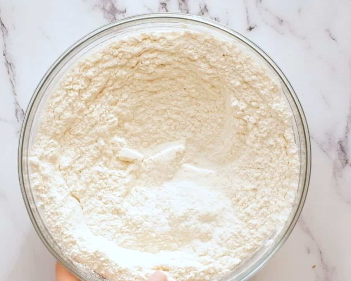 Dry ingredients in a glass bowl.