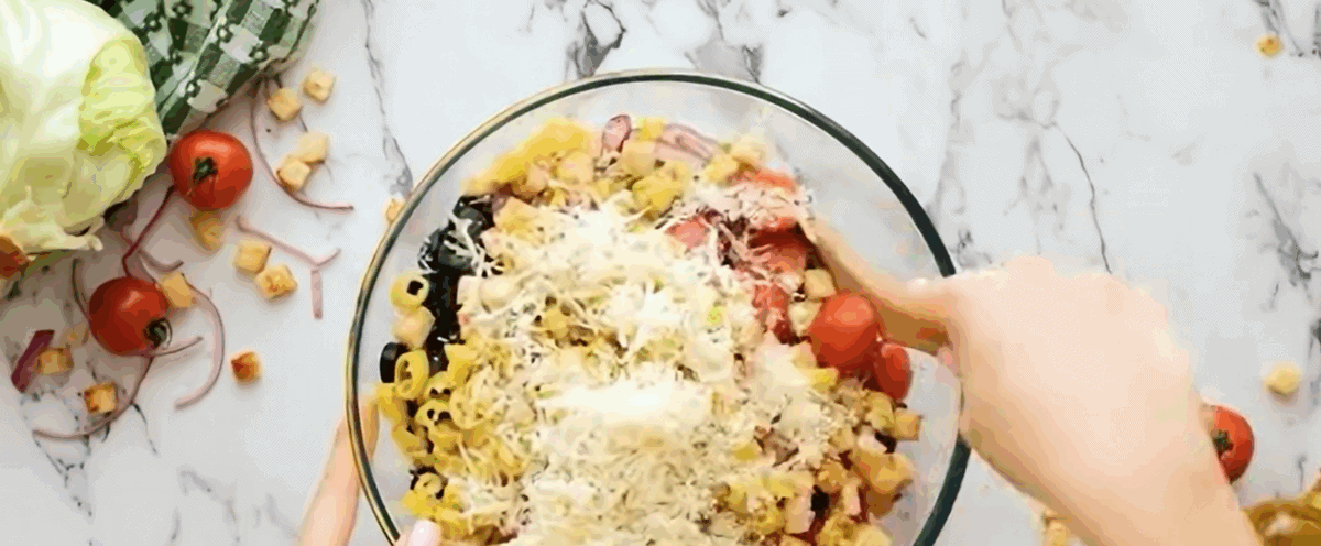 Combining the ingredients to make the salad. 