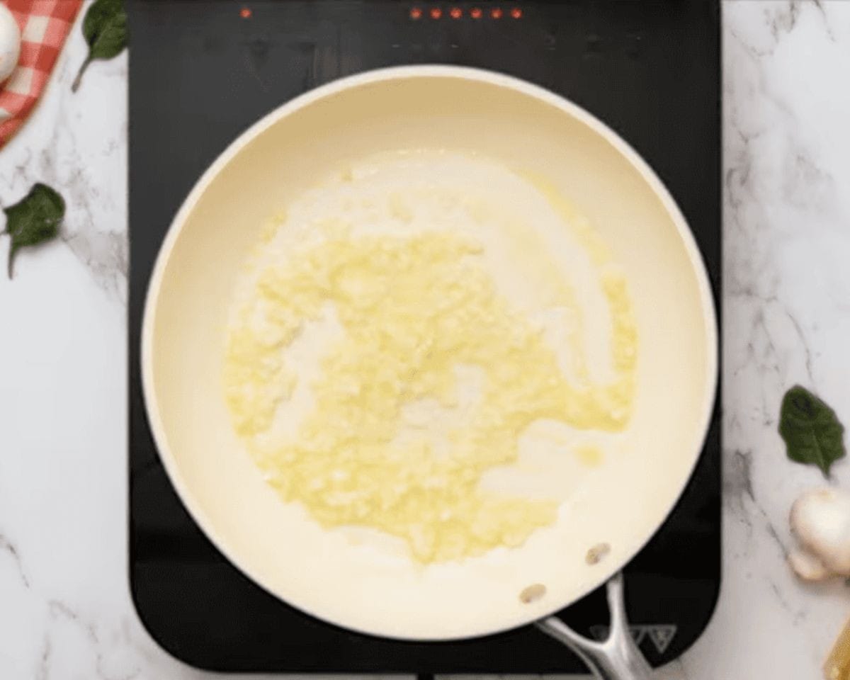 Cooking an onion in oil/butter mixture.