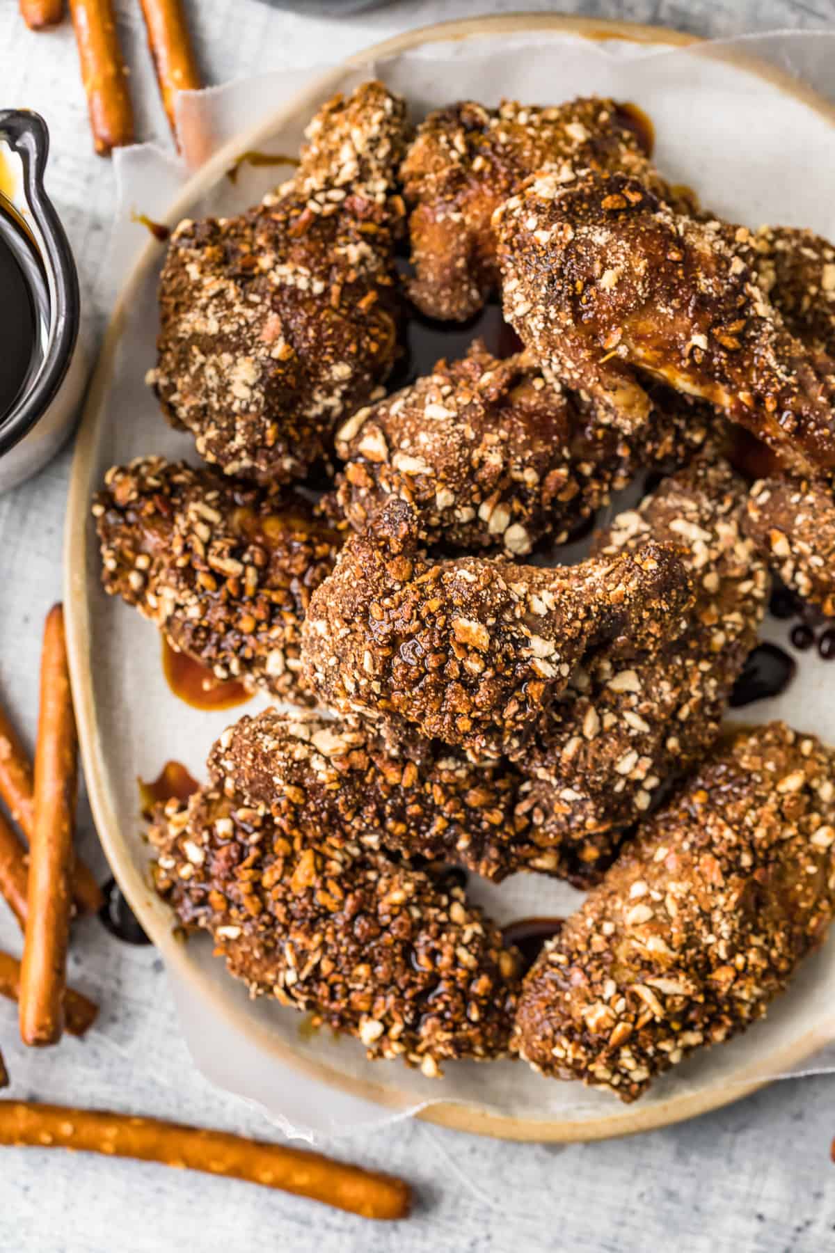 overhead shot of beer and pretzel chicken wings