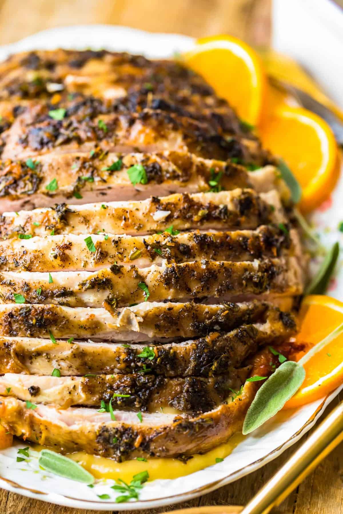 Sliced turkey breast with fresh herbs