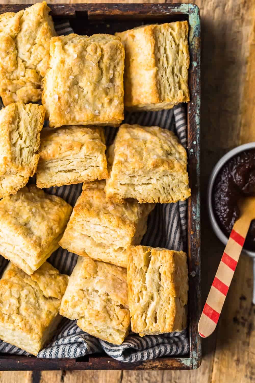 Easy Buttermilk Biscuits with jam and a spoon.