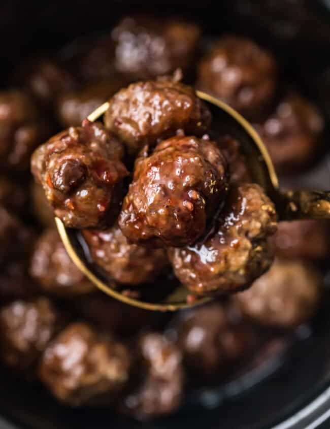 grape jelly meatballs in a spoon