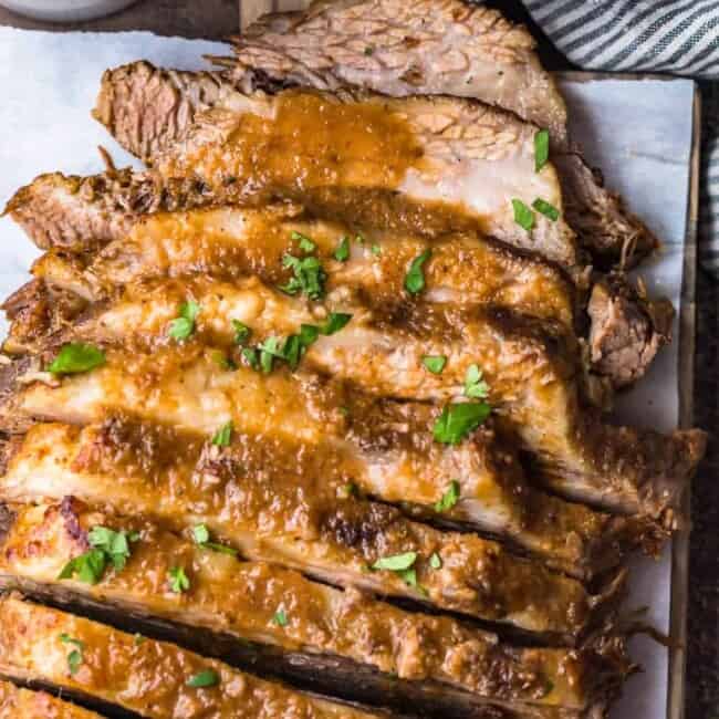 sweet and sour sliced brisket on a platter