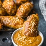 chicken wing dipped in peanut sauce